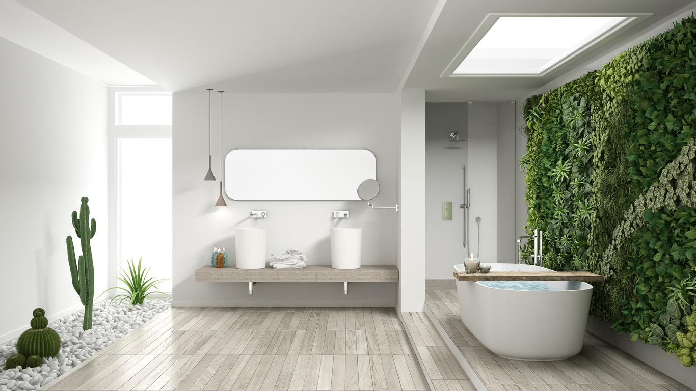 Salle de bain tendance 2026 — douche italienne, vanité flottante bois et robinetterie laiton brossé