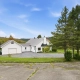Vue extérieure d’une maison blanche à Saint-Sylvestre