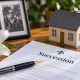 Documents successoraux et maison symbolique pour une vente immobilière au Québec